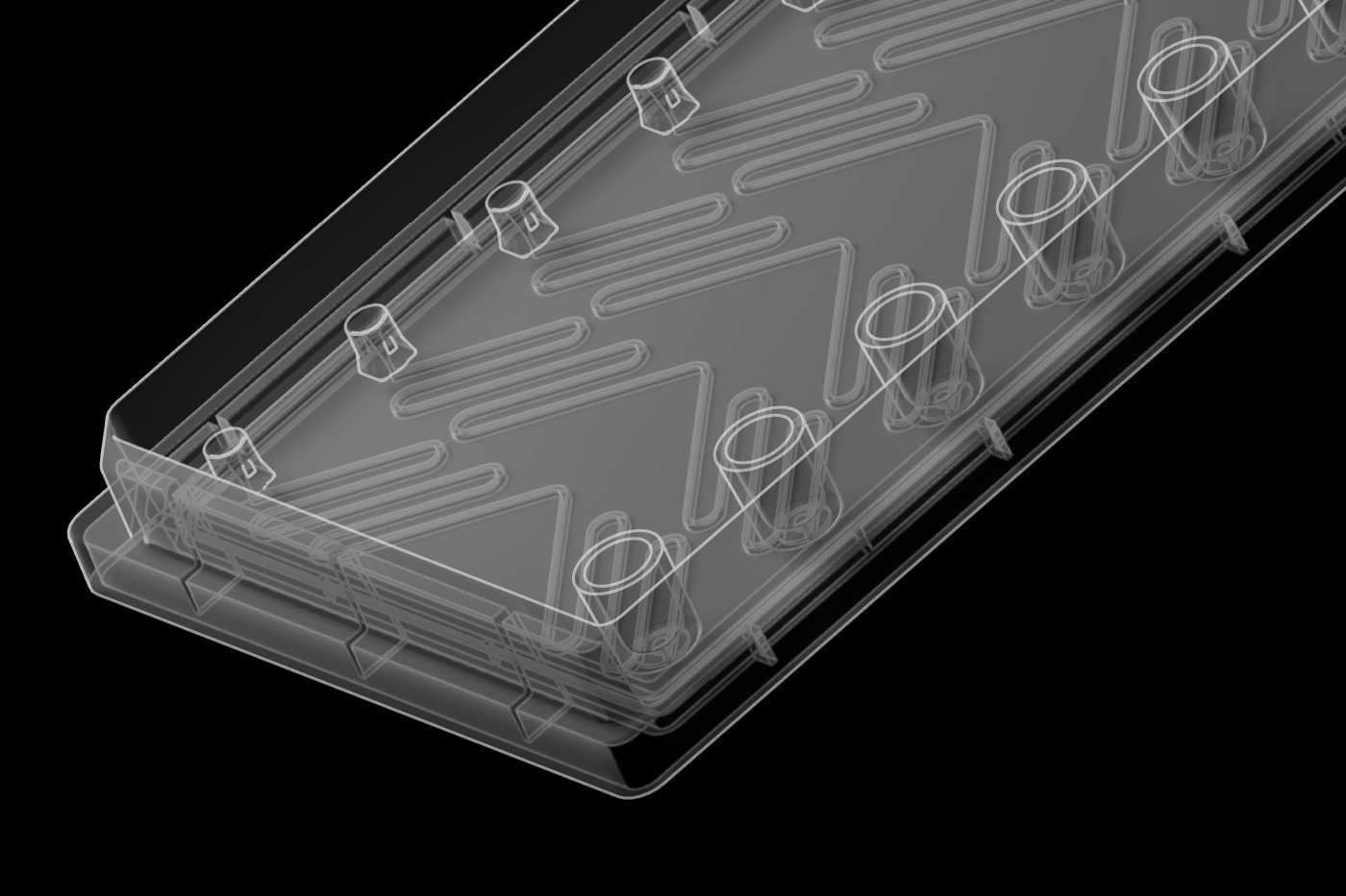 A SLAS format microfluidic device with 6 sets of meandering channels connecting pipette interfaces to reservoirs.