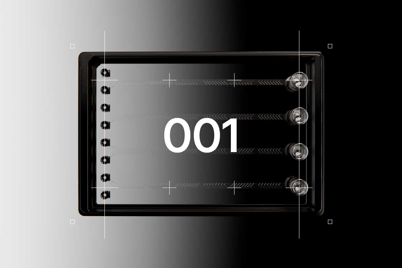 A SLAS format microfluidic device with four sets of identical channels. Each channel has two pipette interfaces on one end and a reservoir on the other end. Herringbone mixers occupy the majority of each channel’s length. Bold, graphic text at the center reads "001."