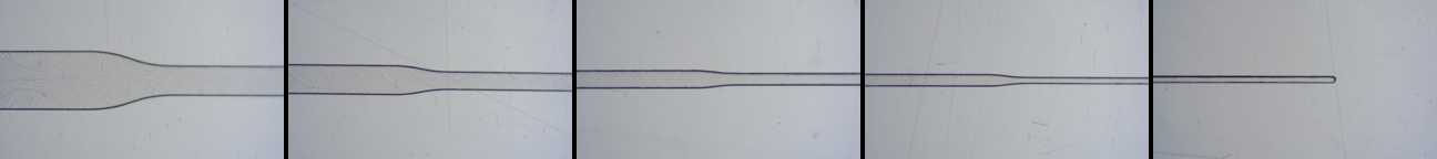 Close-up of a Transition Molded microfluidic channel that steps down from 500 microns to 50 microns. The channel geometry is clearly defined, with sharp edges even at 50 microns.
