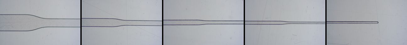 Close-up of a Transition Molded microfluidic channel that steps down from 500 microns to 50 microns. The channel geometry is clearly defined, with sharp edges even at 50 microns.